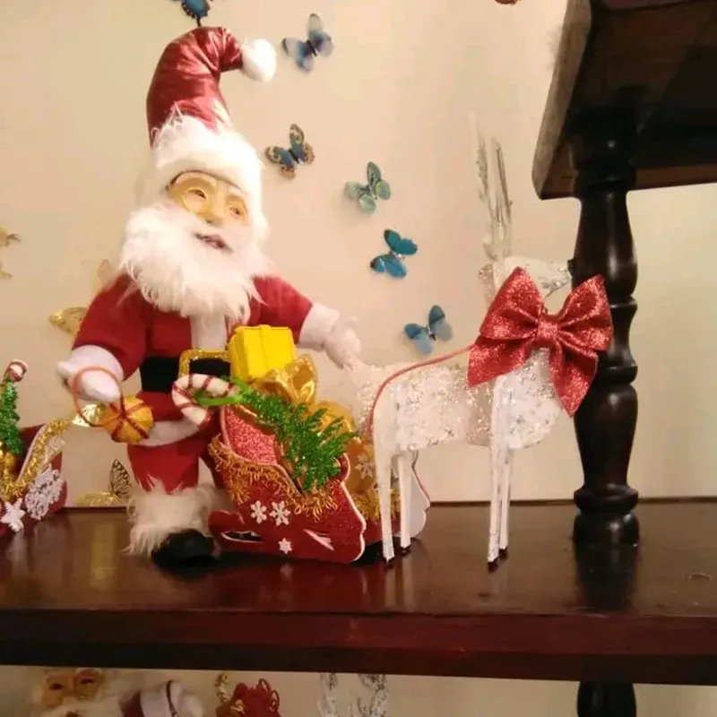 Santi clo con trineo