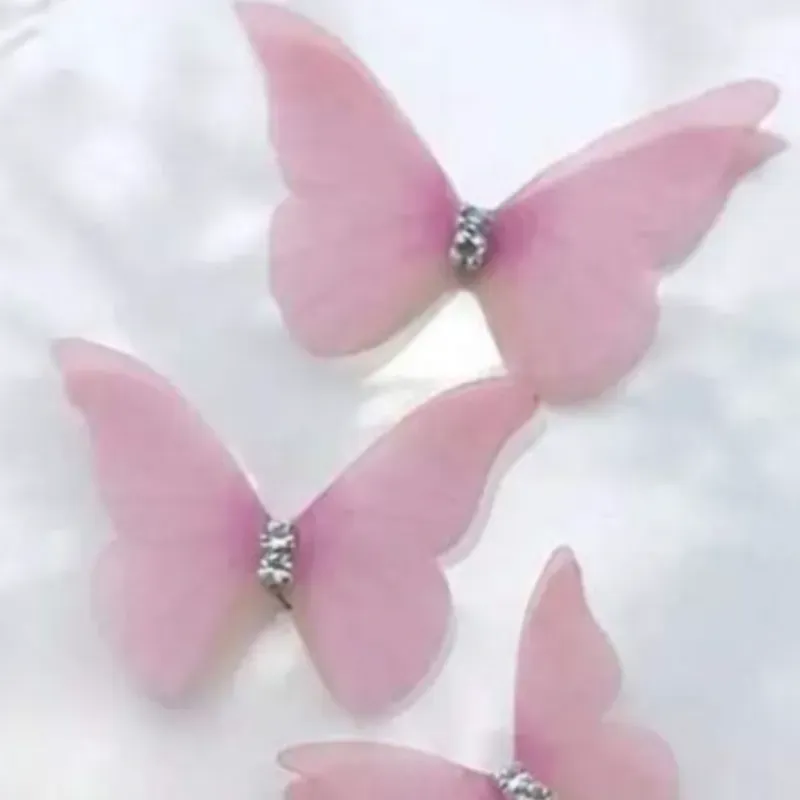 Mariposa rosada pequeña