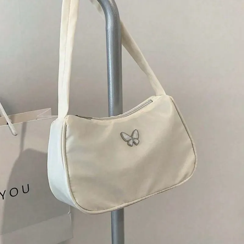 Bolso de hombro minimalista con mariposa