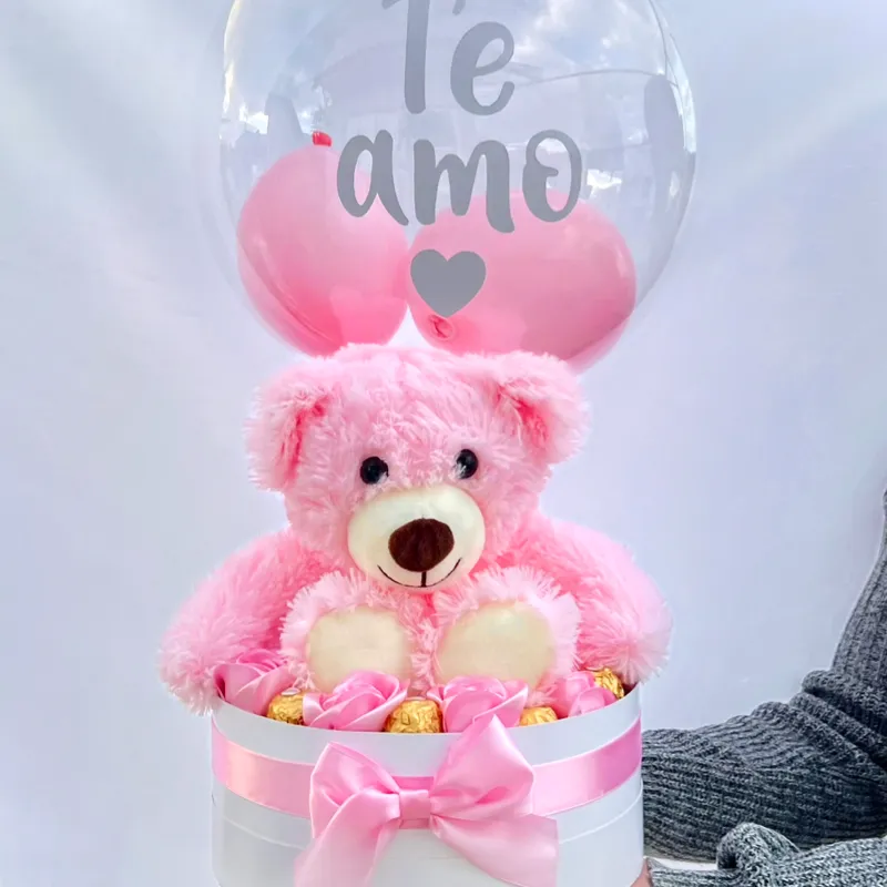 Caja circular con peluche