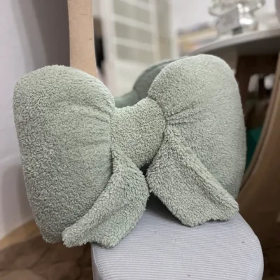 Cojín en forma de lazo