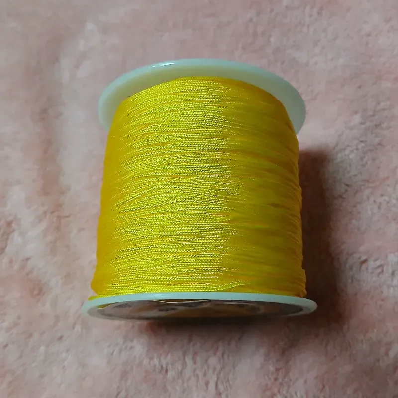 Hilo chino amarillo claro 0.8 mm
