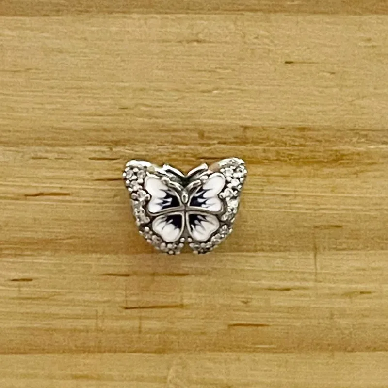 Charm Mariposa Azul fija