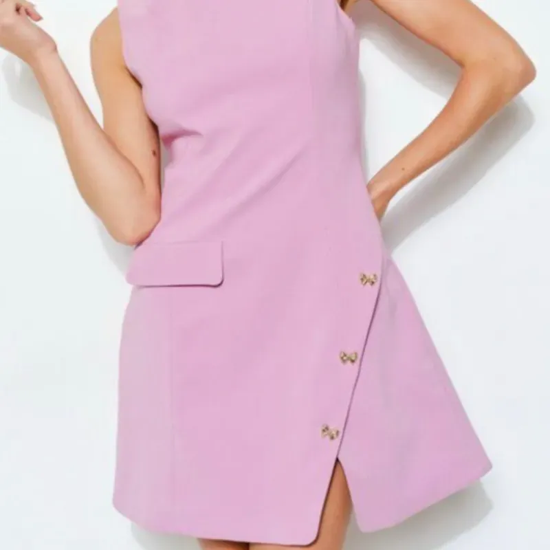 Vestido elegante rosado de abertura en la pierna