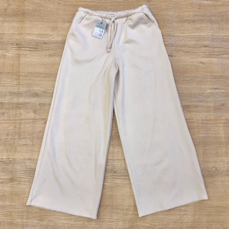 Pantaloneta de felpa color crema