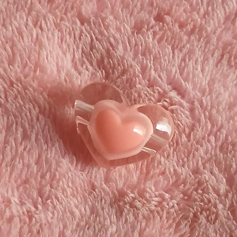 Corazón grande transparente centro naranja