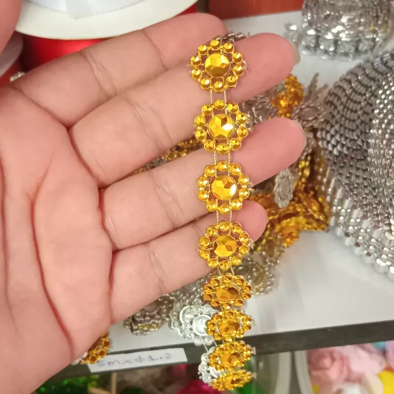 Cinta plástica  flor dorada 1mx