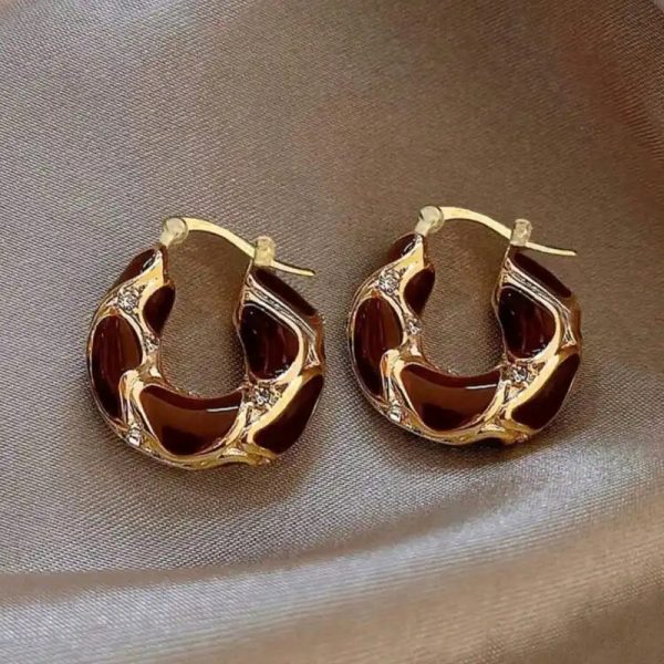 Aretes rojos y dorados
