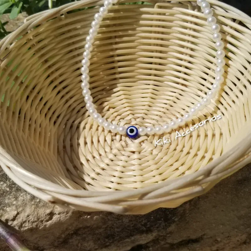 Collar perlas y ojo turco