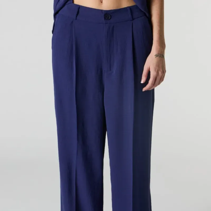 Pantalon de pinzas blanco.