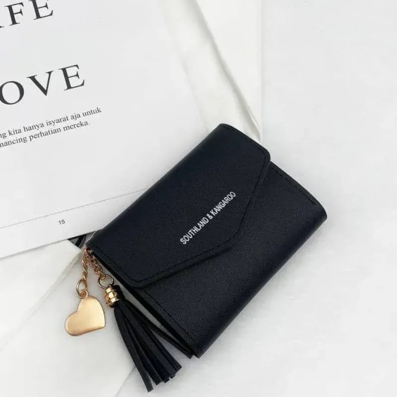  Monedero Black Charm – Minimalismo elegante con toque dorado y diseño emocional