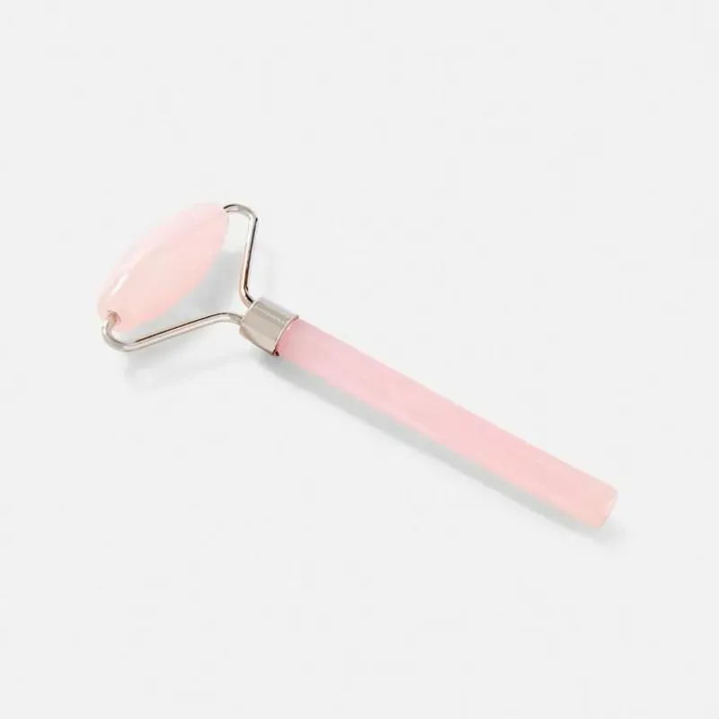 Rodillo facial de cuarzo rosa