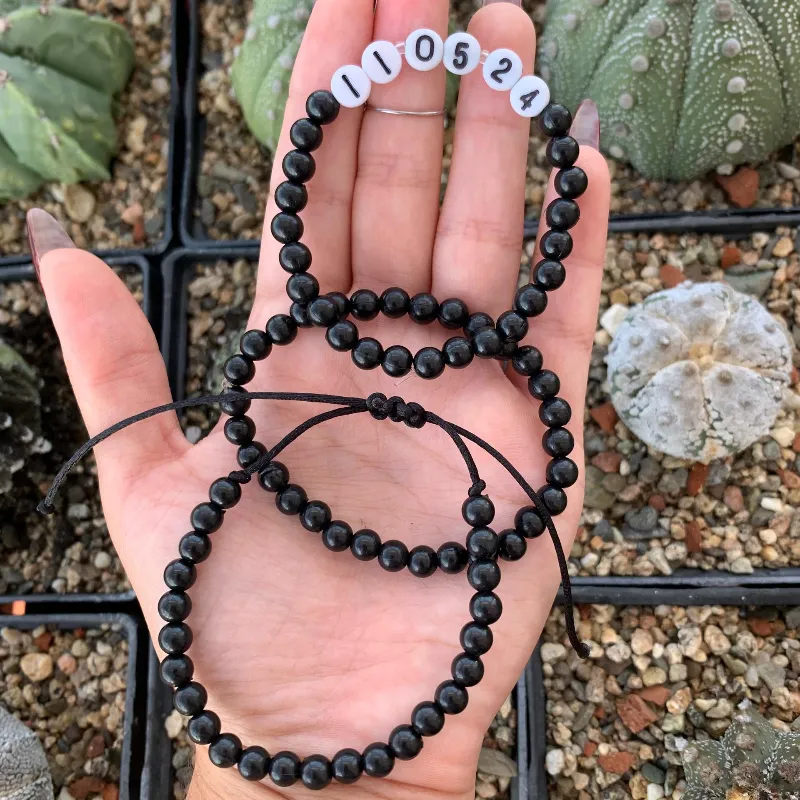 Pulseras perlas negras