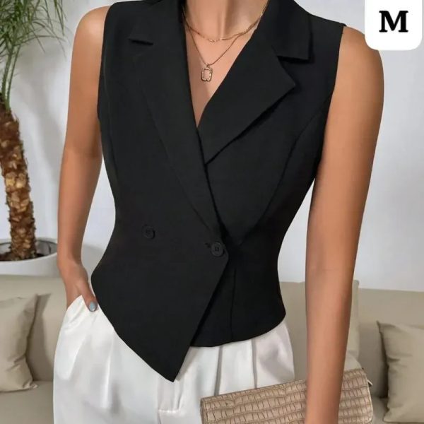  Conjunto Black & White Executive – Elegancia estratégica con blazer sin mangas y pantalón de talle alto