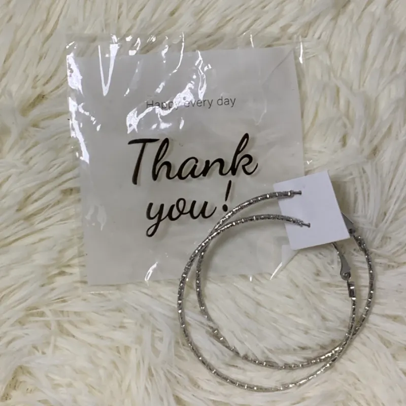 Aretes plateados, modelo #6. 