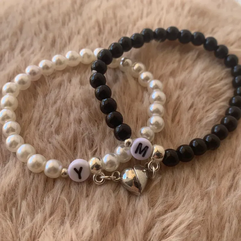 Pulseras de perlas 0.6 con corazon magnetico