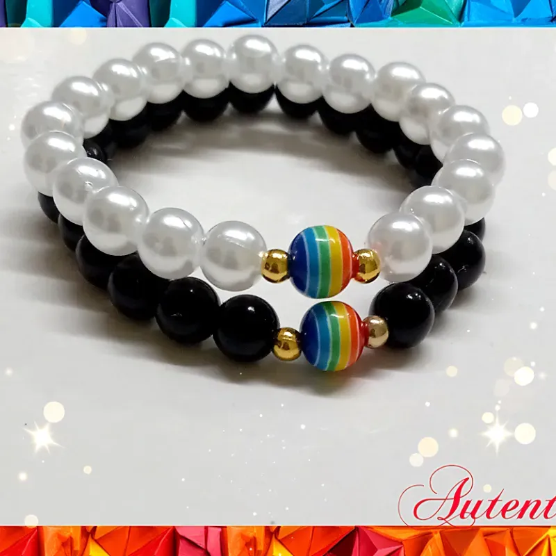 Pareja de perlas con arcoiris