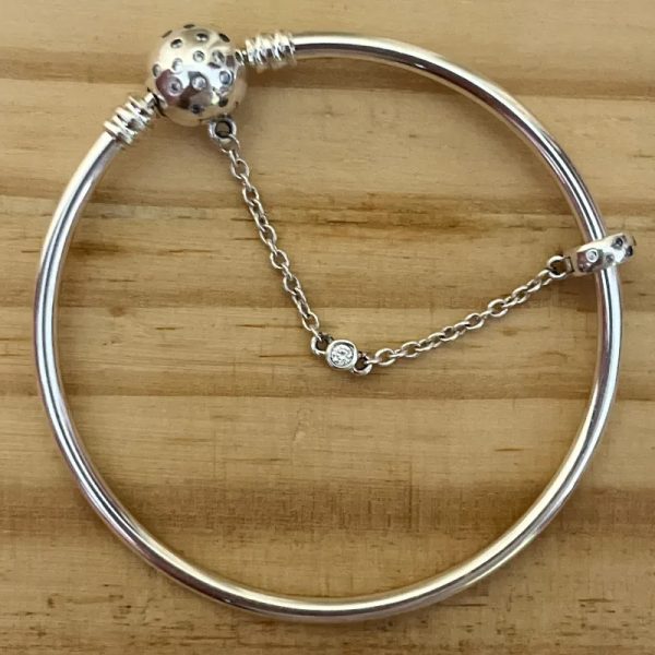 Pulsera rígida con cierre de seguridad