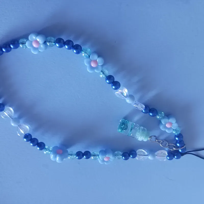 Colgante con pomito fluorescentes