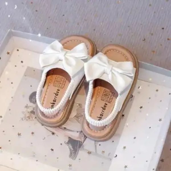 Sandalitas blancas con lazo