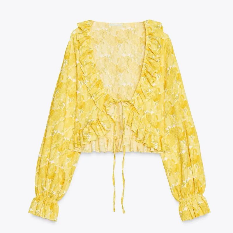 Top amarillo de flores