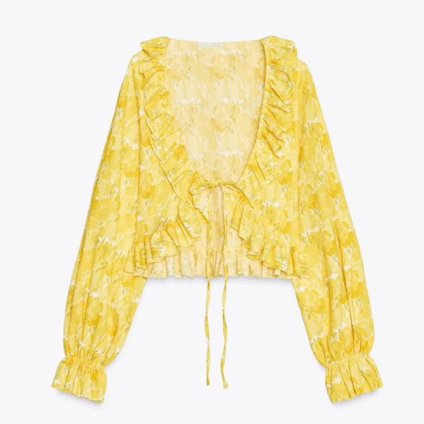 Top amarillo de flores