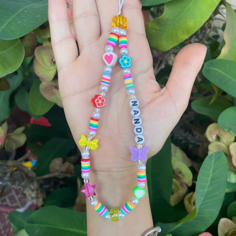 Colgante de celular de perlas y fimos  personalizado