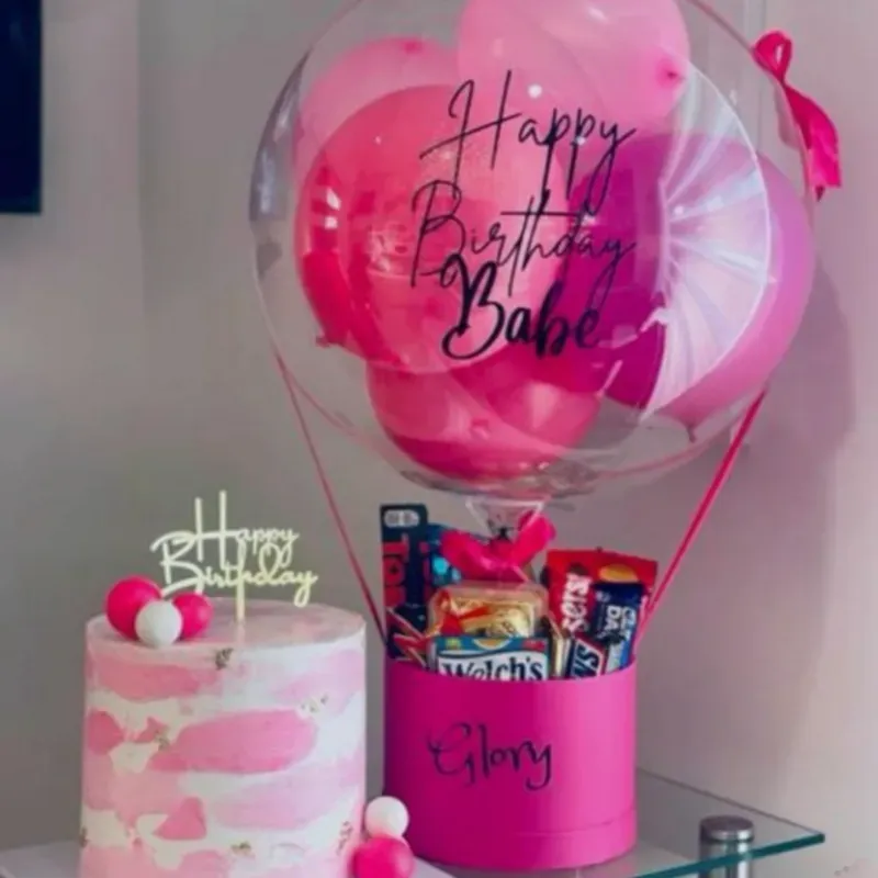 Globos de golosinas con pastel