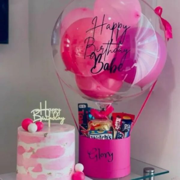 Globos de golosinas con pastel