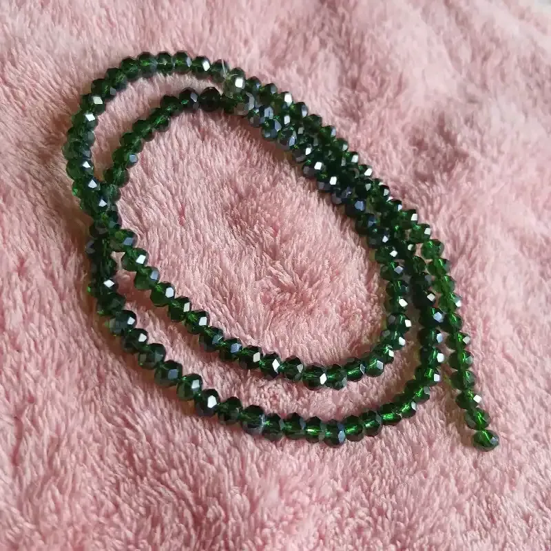 Swaroski tira 4mm verde botella transparente