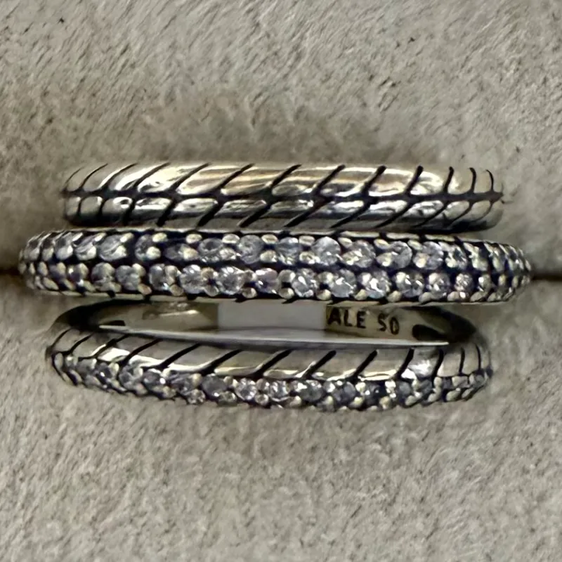 Anillo triple trenzado