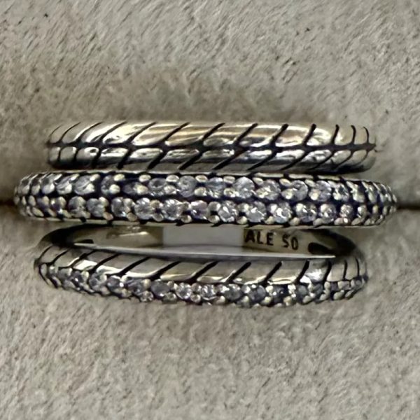 Anillo triple trenzado