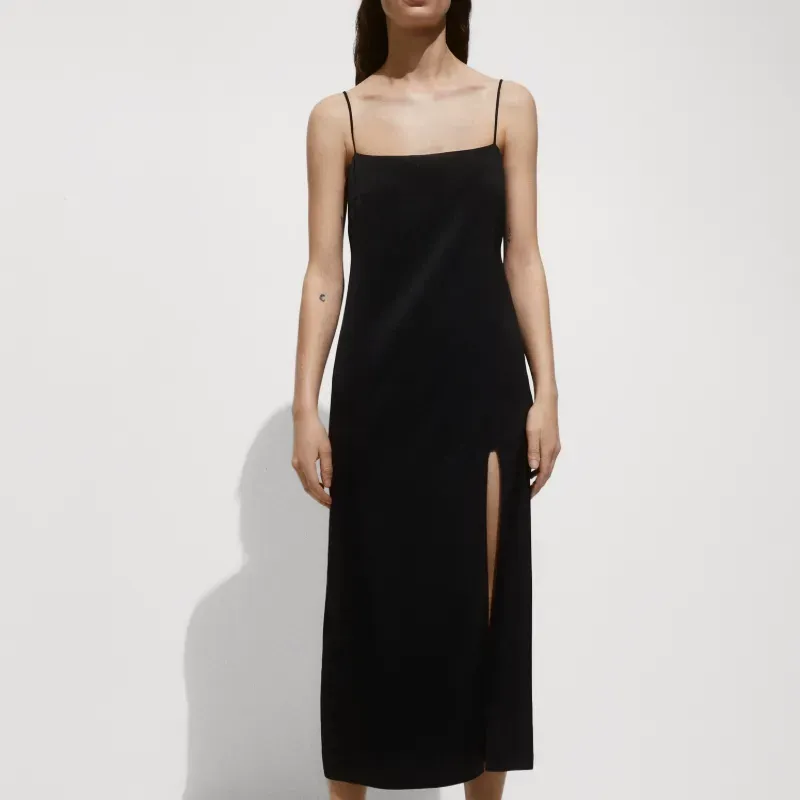 Vestido Mango satinado negro con abertura