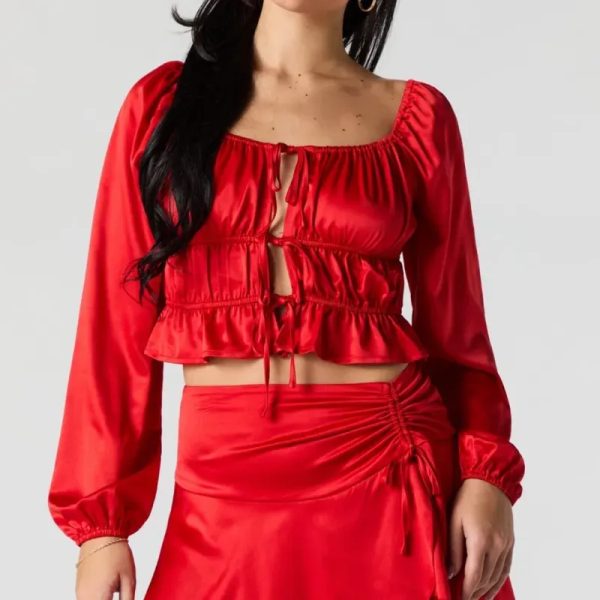 Blusa roja mangas alargadas
