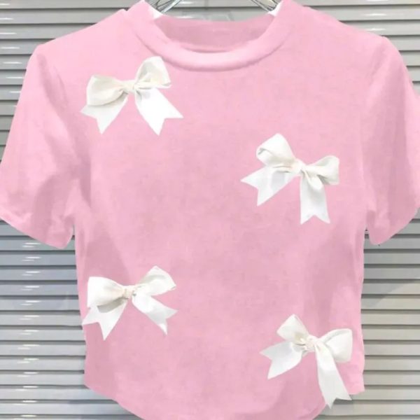 Camiseta rosada con lazos