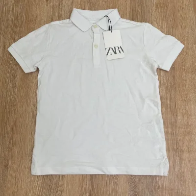Polo color blanco