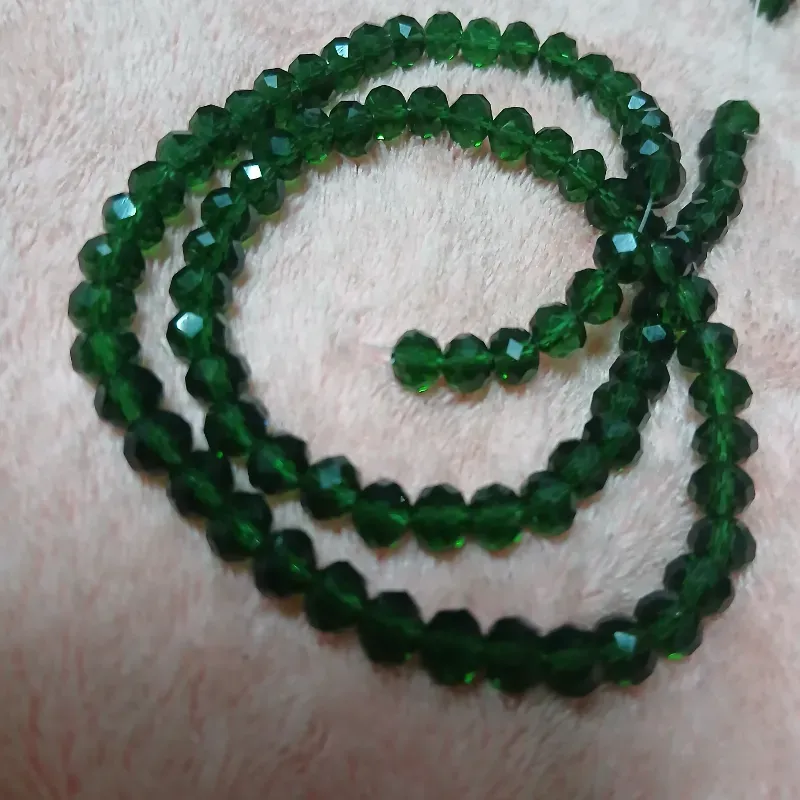 Swaroskis tira 6 mm verde botella transparente