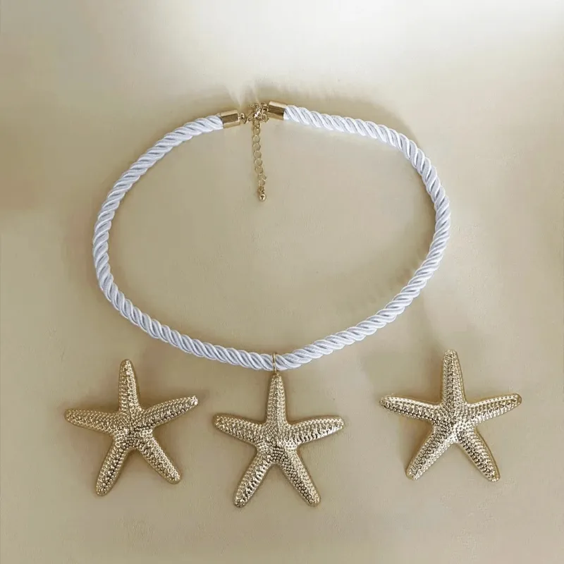 Collar + pendientes de estrella
