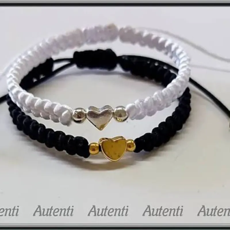 Pareja de corazon dorado -plateado tejido