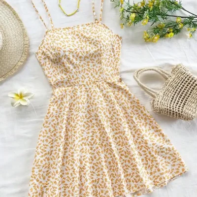 Vestido amarillo de tirantes estampado