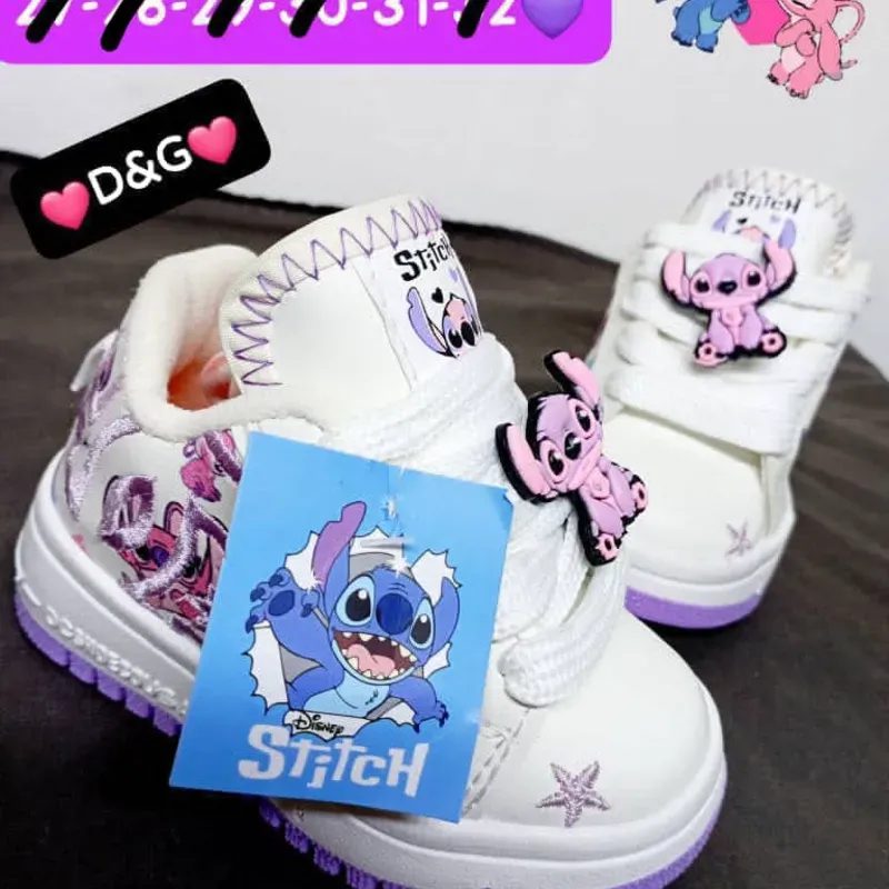 DOLCE & GABBANA STITCH ANGEL SUELA MORADA  Alumbran