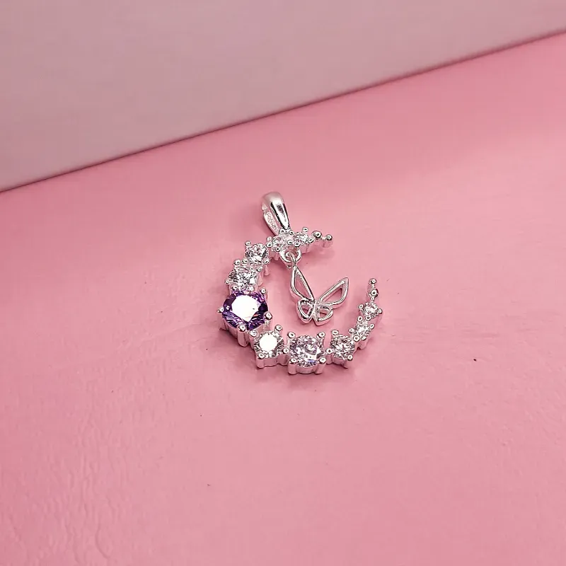 Dije de luna celta  con mariposa colgante