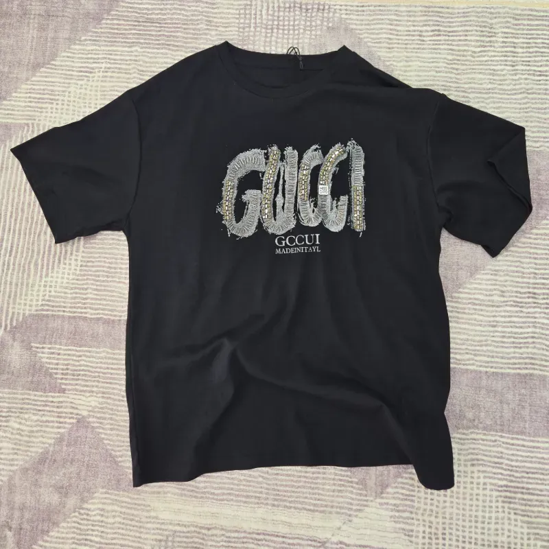 Pulover negro Gucci plateado