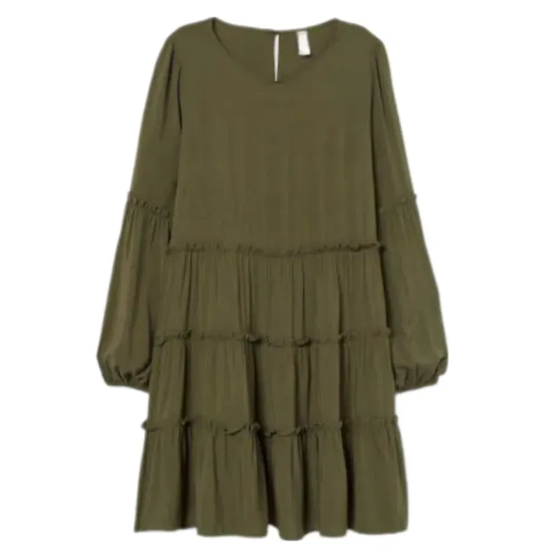 Vestido con vuelos y mangas largas