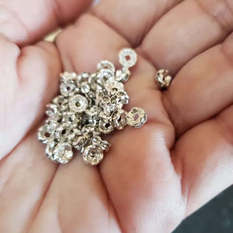 Rondel de 4mm plateado con incrustaciones