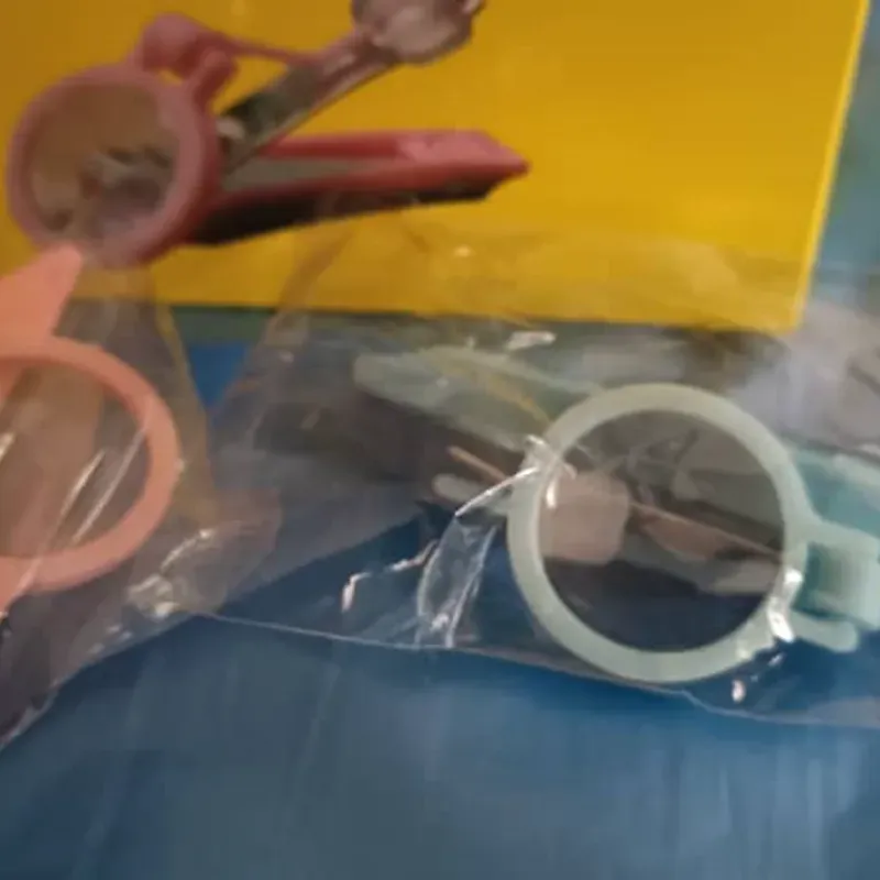 Corta uñas con lupa