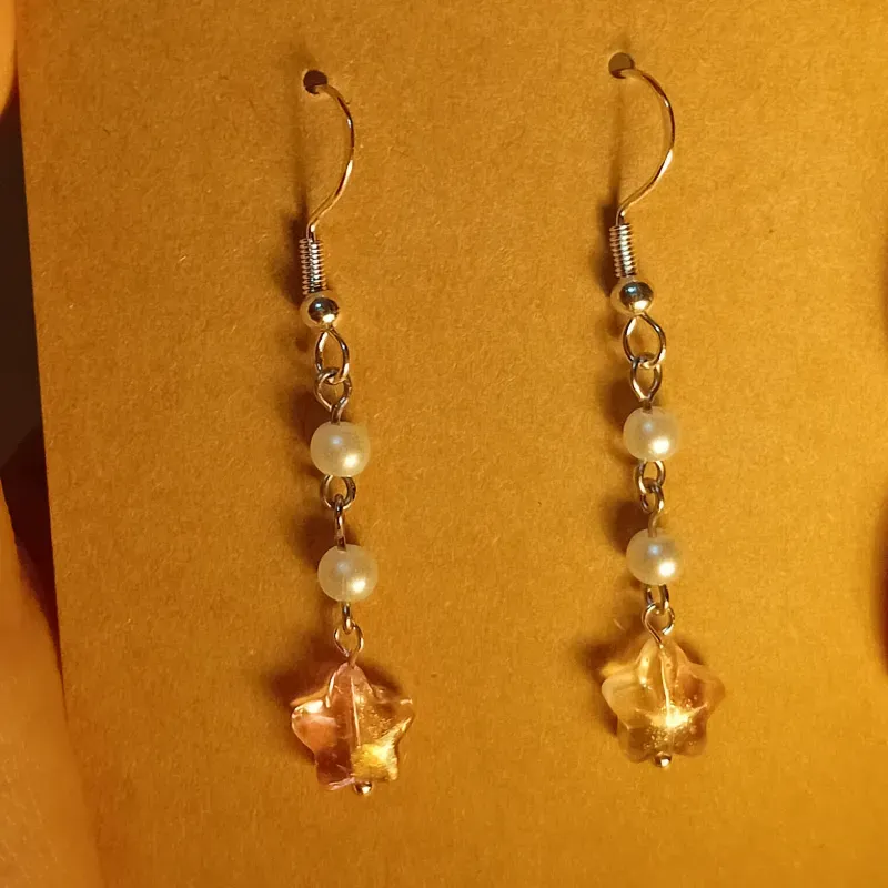 Aretes de estrella y perlas