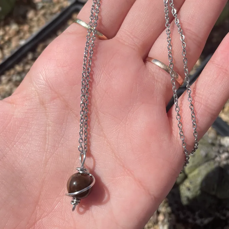 Collar Saturno de Acero inoxidable