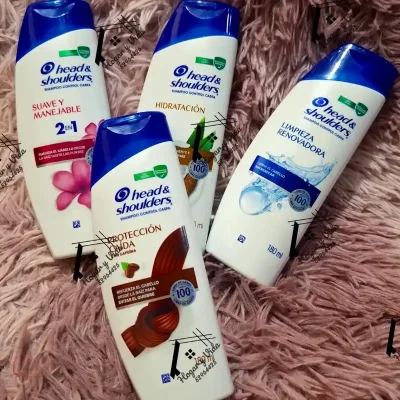 champú Head & Shoulders Control Caspa, específicamente la variante "Protección Caída" con cafeína.  180ml