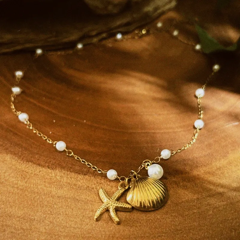Cadena dorada de concha + estrella